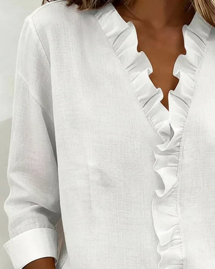 VELLORÉ | Blusa elegante con escote en V y volantes, mangas largas