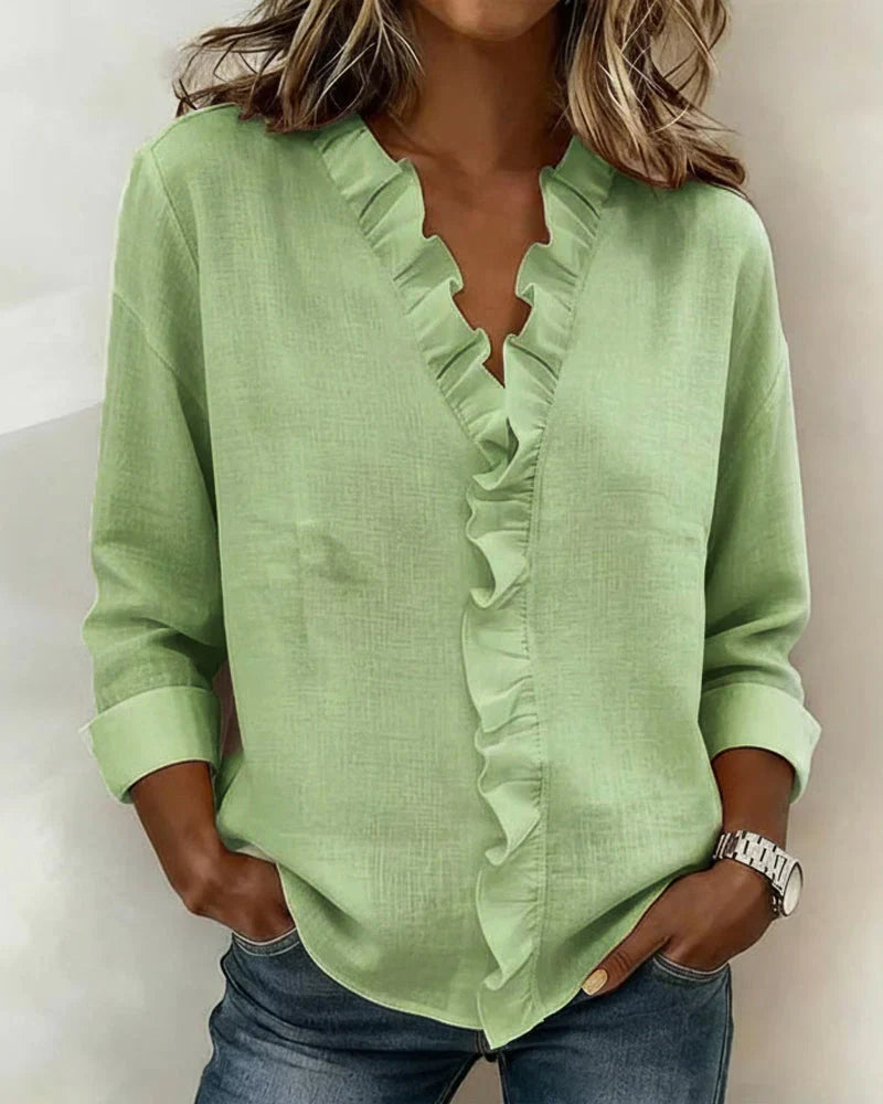 VELLORÉ | Blusa elegante con escote en V y volantes, mangas largas