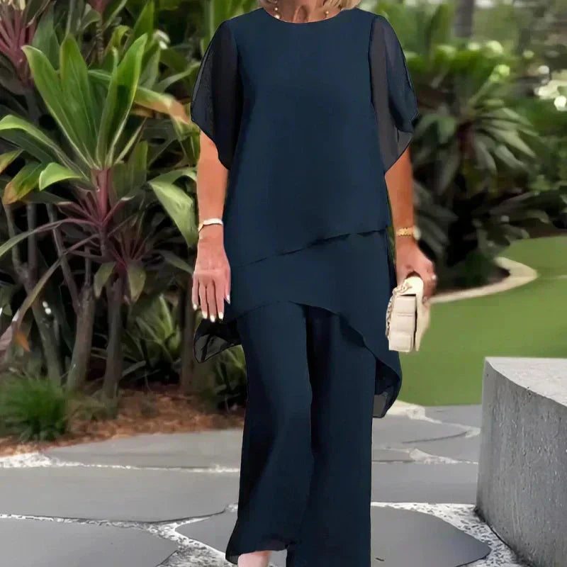 VELLORÉ | Conjunto compuesto por un top irregular fascinante y pantalones de pierna ancha