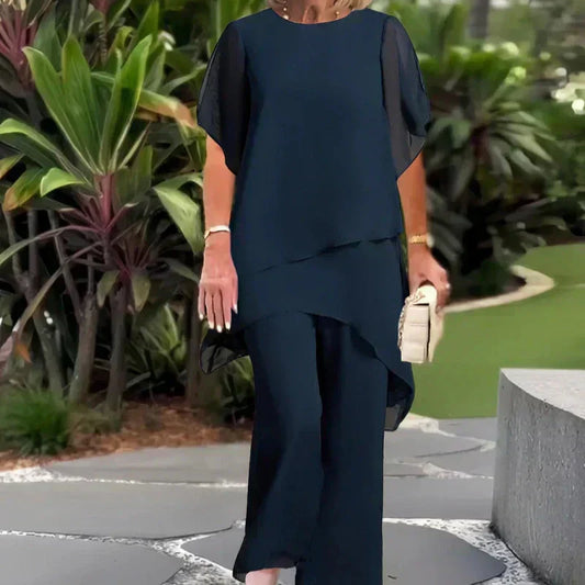 VELLORÉ | Conjunto compuesto por un top irregular fascinante y pantalones de pierna ancha