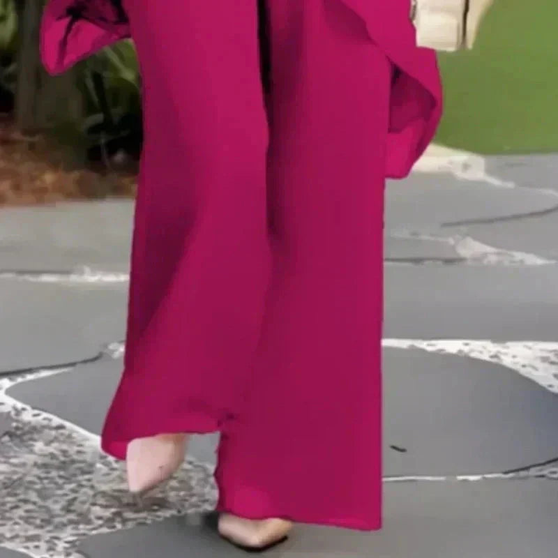 VELLORÉ | Conjunto compuesto por un top irregular fascinante y pantalones de pierna ancha