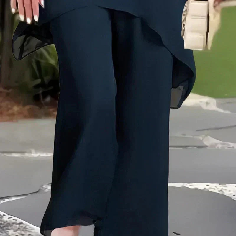 VELLORÉ | Conjunto compuesto por un top irregular fascinante y pantalones de pierna ancha